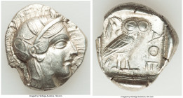 ATTICA. Athens. Ca. 440-404 BC. AR tetradrachm (27mm, 16.75 gm, 5h). AU, cut. Mid-mass coinage issue. Head of Athena right, wearing earring, necklace,...