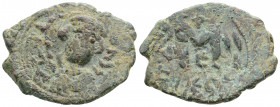 Byzantine
Constans II (641-668 AD) Constantinopolis, overprinted on the follis of Heraclius. illegible office (4th?) 
AE Follis (28.5mm 6.4g)