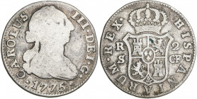 1775. Carlos III. Sevilla. CF. 2 reales. (AC. 783). 5,53 g. BC/BC+.