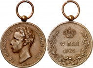 1902. Alfonso XIII. Mayoría de edad. (V. 598). Grabador: B. Maura. Con anilla. Bronce. 11,84 g. Ø30 mm. EBC-.