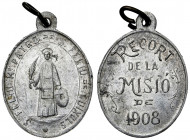 1908. Sant Feliu de Guíxols. Recort de la Misió. (Cru.Medalles 1366). Con anilla. Ovalada. Aluminio. 1,33 g. MBC+.