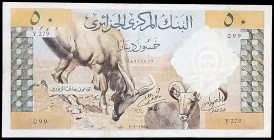 Argelia. Banco Central. 50 dinars. (Pick 124a). Doblez. MBC+.