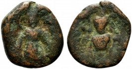 India, Kushan Empire. Kanishka I (c. AD 127-151). Æ Didrachm (21mm, 7.18g, 12h). Kanishka standing l., holding goad and standard, sacrificing over alt...