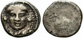 Etruria, Populonia, c. 300-250 BC. AR 20 Asses (21mm, 8.46g). Youthful head of Herakles facing; [X-X] flanking neck, below. R/ Blank. Vecchi, EC Group...