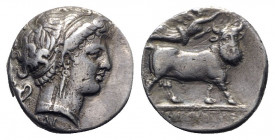 Southern Campania, Neapolis, c. 320-300 BC. AR Didrachm (18mm, 6.96g, 3h). Head of nymph r., wearing band in hair; kantharos to l., ΔI below. R/ Man-h...