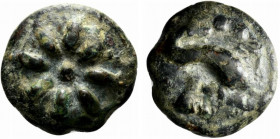 Northern Apulia, Luceria, c. 217-212 BC. Cast Æ Teruncius (27.5mm, 26.49g). Star of eight rays on a raised disk. R/ Dolphin r.; three pellets above, L...