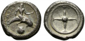 Southern Apulia, Tarentum, c. 480-470 BC. AR Nomos (19mm, 7.57g). Taras riding dolphin r.; cockle shell below. R/ Wheel of four spokes. Vlasto 80-1; H...
