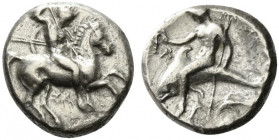 Southern Apulia, Tarentum, c. 315-302 BC. AR Nomos (19.5mm, 8.42g, 12h). Warrior, holding shield and two spears, preparing to cast a third, on horseba...