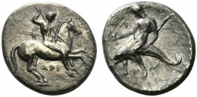 Southern Apulia, Tarentum, c. 330-302 BC. AR Nomos (21mm, 7.04g, 3h). Warrior on horseback r., holding shield, two lances, and spear; Ξ to l., API bel...