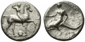 Southern Apulia, Tarentum, c. 302 BC. AR Nomos (20.5mm, 7.54g, 2h). Nude youth, crowning himself, on horseback r.; below, ΣA above Ionic capital. R/ P...