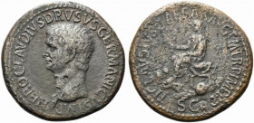 Nero Claudius Drusus (died 9 BC). Æ Sestertius (36.5mm, 26.63g, 6h). Rome, 42-3. Bare head l. R/ Claudius seated l. on curule chair, holding branch an...