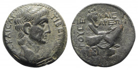 Claudius (41-54). Cilicia, Uncertain Caesarea. Æ (25mm, 9.85g, 12h), year 5 (AD 45/6). Bare head r. R/ Tyche seated r. on rocks, holding grain ears; b...