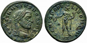 Constantius I (Caesar, 293-305). Æ Follis (29mm, 9.40g, 12h). Ticinum, 296-7. Laureate head r. R/ Genius standing l., holding patera and cornucopia; *...