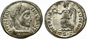 Constantine I (307/310-337). Æ Follis (18mm, 3.17g, 6h). Thessalonica, AD 319. Laureate and cuirassed bust r. R/ Victory walking l., holding wreath an...