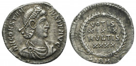 Constantius II (337-361). AR Siliqua (18mm, 2.02g, 6h). Sirmium, 351-5. Pearl-diademed, draped and cuirassed bust r. R/ VOTIS/XXX/MVLTIS/XXXX in four ...