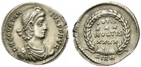 Constantius II (337-361). AR Siliqua (20mm, 2.24g, 12h). Sirmium, 351-5. Pearl-diademed, draped and cuirassed bust r. R/ VOTIS/XXX/MVLTIS/XXXX in four...