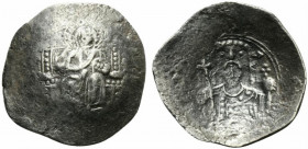 Alexius I (1081-1118). AR Aspron Trachy (25.5mm, 3.87g, 6h). Constantinople, after AD 1092. Nimbate Christ seated facing on throne, raising hand in be...