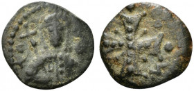 Alexius I Comnenus (1081-1118). Æ Tetarteron (15mm, 2.05g, 12h). Crowned facing bust, holding cross-sceptre and globus cruciger. R/ Decorated voided c...