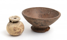 Lot of 2 (two) Etruscan potteries; an Etruscan-Corinthian Aryballos (intact, with restored rim) and an impasto plate (intact, with chipped foot); ca. ...