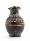 Miniaturistic Apulian Oinochoe; black glazed, with red geometrical patterns; intact; 4th century BC; height cm 6,7