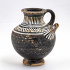 Miniaturistic Gnathia Guttus; black glazed, with red and white geometrical patterns; intact; 4th - 3rd centuries BC; height cm 7,2
