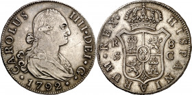 1792. Carlos IV. Sevilla. C. 8 reales. (AC. 1054). Leves rayitas. Buen ejemplar. Escasa. 27,05 g. MBC+.