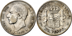 1882/1*1881. Alfonso XII. MSM. 1 peseta. (AC. 18). Golpecito. Rara. 4,94 g. MBC-/MBC.