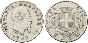 REGNO D’ITALIA. Vittorio Emanuele II, 1861-1878.
Lira 1867 Torino, I° Tipo. Ag 
Dr. Testa del sorvano rivolta a d.
Rv. Stemma sabaudo crociato sorm...
