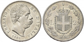 REGNO D’ITALIA. Umberto I, 1878-1900.
2 Lire 1885 Roma, I° Tipo. Ag 
Dr. Testa del sovrano rivolta a d.
Rv. Stemma sabaudo crociato sormontato da c...