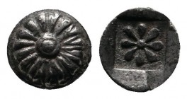 Ionia, Erythrai (?). (c.480-500 BC). Tetartemorion AR. (5mm-0.29g). Rosette. / Rosette in quadratum incusum. Klein 387; Kraay, Colophon 96, 102.