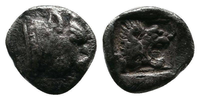 Ionia, Samos. c.600-500 BC. Obol AR (7mm-0,83g). Head of bull right / Head of ro...