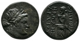 Ionia, Smyrna, (2nd - 1st Century BC.) Æ Homerion (20mm-6,89g). Laureate head of Apollo right / ΣMYΡNAIΩ[N] The poet Homer seated left, holding staff ...