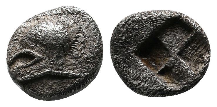 Ionia. Uncertain mint c.600-550 BC. Obol AR. (6mm-0.64g). Corinthian helmet left...