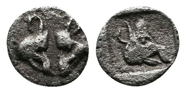 Lesbos, Uncertain mint c.500-450 BC. (6mm-0.28g).AR Obol. Two boars heads confro...
