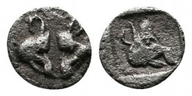 Lesbos, Uncertain mint c.500-450 BC. (6mm-0.28g).AR Obol. Two boars heads confronted / Boars head right in incuse square. SNG Cop. 288; CNG, 199,187.