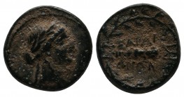 Lydia, Sardeis. c.200-50 BC. Æ (13mm-3,09g). Laureate head of Apollo right within dotted border / ΣΑΡΔΙΑ-ΝΩΝ around club within oak-wreath; monogram t...