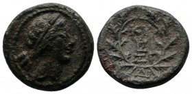 Mysia, Kyzikos. 2nd-1st centuries BC. Æ (18mm-4,96g). Laureate head of Kore Soteira right. / KY ZI. Legend and monogram within oak-wreath; second mono...