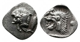 Mysia, Kyzikos. C450-400 BC. AR Hemiobol (8mm-0,37g) Forepart of boar left; to right, tunny upward / Head of lion left; star to left; all within incus...