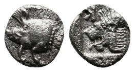 Mysia, Kyzikos. c.450-400 BC. AR Hemiobol (8mm-0,37g) Forepart of boar left; to right, tunny upward / Head of roaring lion left; retrograde K to upper...