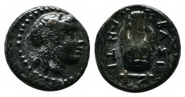 Seleukid Kingdom, Sardeis. Antiochos II Theos, c.261-246 BC. Sardes. Æ (10mm-1.36g). Laureate head of Apollo right. / BAΣI / ANTI. Lyre. Controls: Mon...