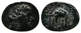Seleukid Kingdom, Sardeis. Antiochos III Megas 223-187 BC. Æ (13mm-1.17g). Laureate head of Apollo right / ANTIOXOΥ, elephant advancing left; ΔI in ex...