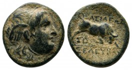 Seleukid Kingdom, Seleukos I Nikator. 312-281 BC. Æ (14mm-2.38g). Sardes mint. Struck 282-281 BC. Winged head of Medusa right / Bull butting right; ΣI...