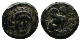 Troas, Gergis. 4th century BC. Æ (11mm-2.12 g). Laureate head of the sibyl Herophile facing slightly right. / Sphinx seated right on grain ear; monogr...