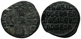 Basil I. 867-886 AD. Æ Follis, (24mm-4,67g). Constantinople. + BASILIOS bASILEVS ✱. Basil enthroned facing, wearing crown and loros, holding labarum a...