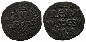 Theophilus. 829-842 AD. Æ Follis. (21mm-2,17g). Constantinople mint. Struck 830/1-842 AD. ΘЄOFIL' ЬASIL'. Half-length bust facing, holding labarum and...
