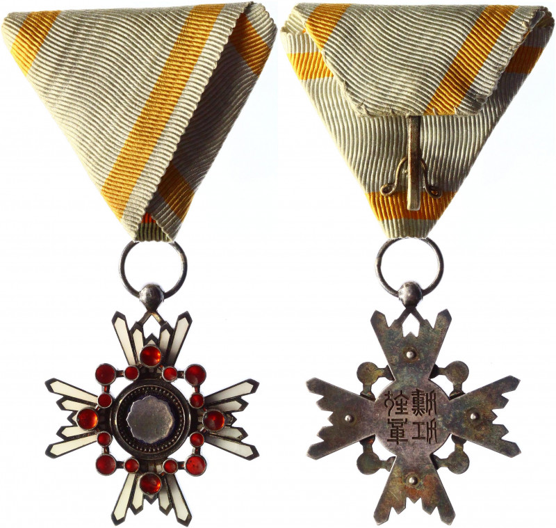 Japan Order of the Sacred Treasure VII Class Badge 1888
Barac# 56; Silver. Cond...