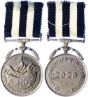 Nepal Remote Area Himalayan Service Medal 1963
Circular silvered bronze medal on double kukri and ribbon bar suspension; the face with a stylised lan...