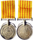 Nepal Medal for the Coronation of King Bīrendra 1975
Circular silver medal on double kukri ribbon suspension bar; the face with the Royal Headdress c...