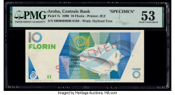 Aruba Centrale Bank 10 Florin 1.1.1990 Pick 7s Specimen PMG About Uncirculated 53. Red Specimen overprints and previous mounting are noted on this exa...