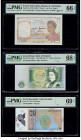 French Indochina Banque de l'Indo-Chine 1 Piastre ND (1949) Pick 54e PMG Gem Uncirculated 66 EPQ; Great Britain Bank of England 1 Pound ND (1981-84) P...
